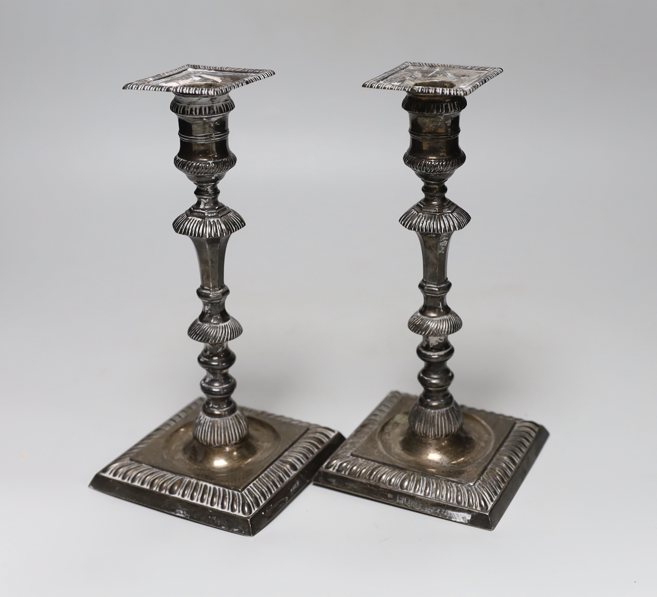 A pair of late Victorian silver candlesticks, with octagonal knopped stems, Thomas Bradbury & Sons, London, 1897, height 23.4cm, weighted.